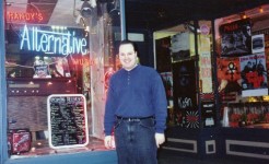 Randy outside his store